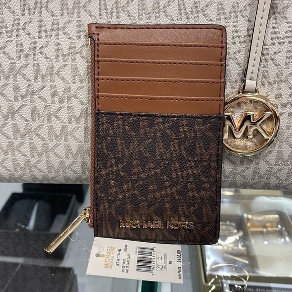 Michael Kors Handbags - Michael Kors Jet Set Travel Medium Top Zip Card Case Wallet
PVC Leathr
Brown
NWT
